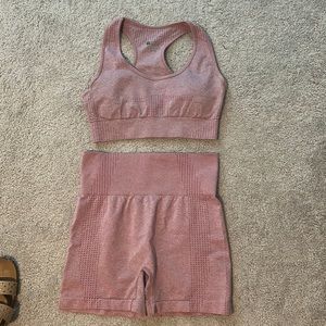 Pink sports bra and shorts size medium